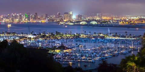 Fototapeta na wymiar Illuminated harbor and city in San Diego at night