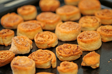 baking in the oven, blushing tasty cookies on the tray