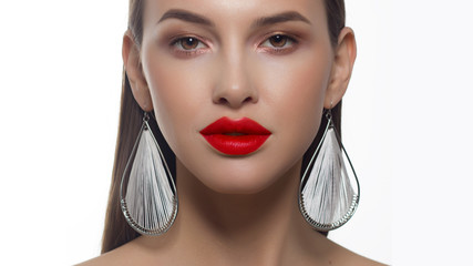 Close-up portrait of a beauty woman with straight hair and perfectly clean skin. Red lips,...