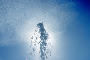 Fountain hits up against the sun