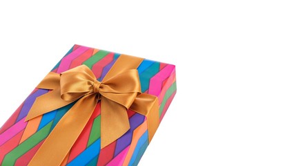 Gift box in bright wrapping paper. Close-up.