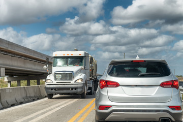 Fototapeta na wymiar Cars and truck traffic along Overseas Highway, Florida
