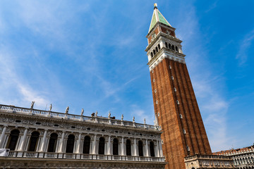 Fototapeta na wymiar St Marks Bell Tower - Campanile; Venice, located in the Piazza San Marco. It is one of the most recognizable symbols of the city.