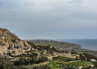 Fototapeta na wymiar Landscape with Dingli cliffs and majestic views of the Mediterranean sea and the lush countryside, Malta