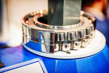 Roller bearing in the cut, demonstration of the mechanism, selective focus