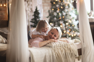 mom and child down syndrome together Christmas