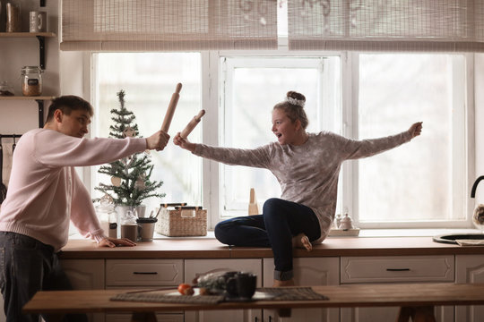 Dad And Daughter Teen Jokingly Fight In Kitchen