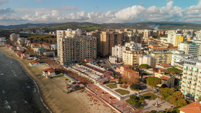 Panoramic aerial view of Follonica, Italy. Coastline of Tuscany with town and ocean