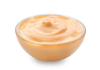 Tasty sauce in bowl on white background