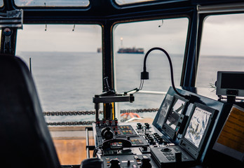 Bridge ship equipment of ffshore dp vessel thruster pitch propellers telegraph handles vhf radio,...