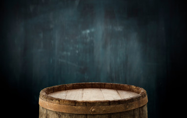 Fototapeta premium background of barrel and worn old table of wood