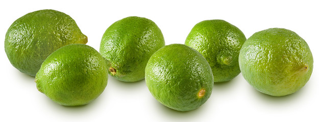 isolated image of green lemons close up