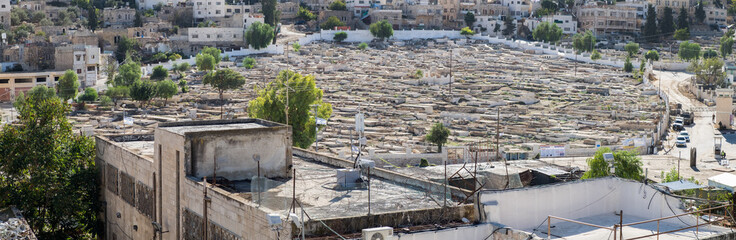 Fototapeta na wymiar large panoramic view on muslim arabian cemetery in Hebron