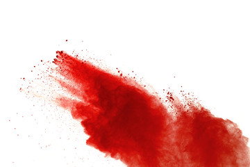 Red powder explosion on white background. Paint Holi.