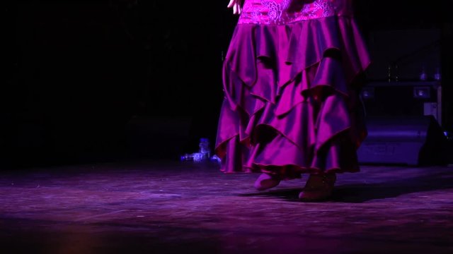 feets of woman flamenco dancing