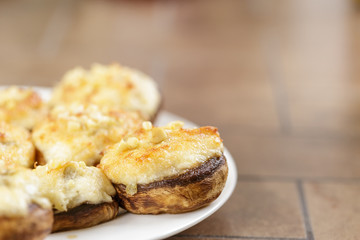 Mushrooms stuffed with crab and cheese baked