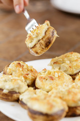 Mushrooms stuffed with crab and cheese baked