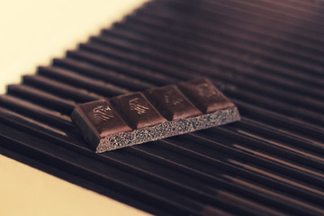 Dark chocolate on a cardboard box. Close up