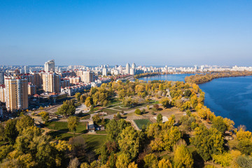 Aerial: Natalka park in Obolon district in Kyiv, autumn time