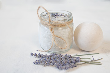 Natural herbal sea salt with aromatic lavender - perfect for relaxation. Cosmetic jars and bottles...