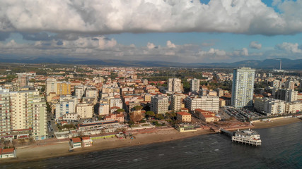 Panoramic aerial view of Follonica, Italy. Coastline of Tuscany with town and ocean