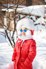 Obraz premium Portrait of cute little girl in winter