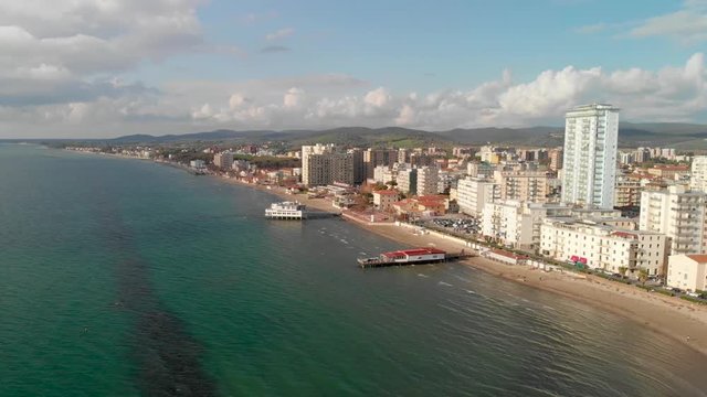 Follonica buildings and ocean, aerial view
