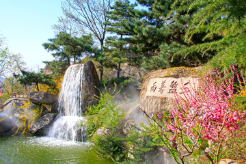 Stone carving works and pool in the Panshan Mountain scenic spot, china