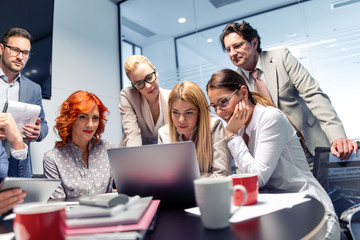 Manager and business team talking in the office