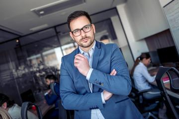 Portrait of young businessman in office