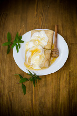 sweet pancakes with cottage cheese, sour cream and