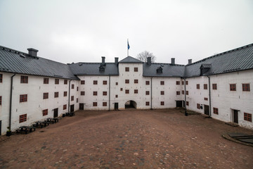 Fototapeta na wymiar Turku Castle in Finland on a cloudy day
