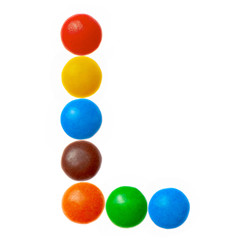 Letter L of sweet colored candies, alphabet isolated on white background