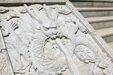 dragon king stone sculpture in a temple