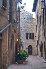 Street of the historical village of San Gimignano, Tuscany, Italy