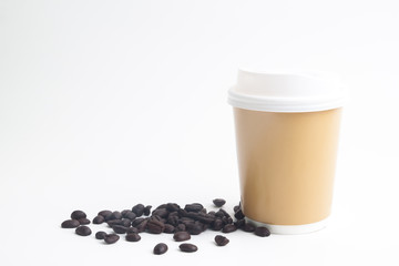 A cup of hot coffee mock up for brand or logo with roasted coffee beans on white background