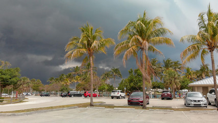 Obraz premium JUPITER, FL - APRIL 2018: Car park in Dubois Park on a stormy day