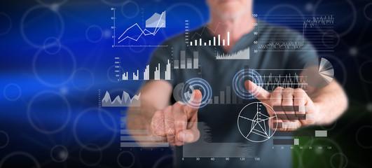 Man touching a financial analysis concept
