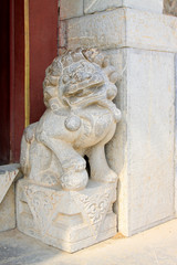 Fototapeta na wymiar beast sculpture on the rock in a temple