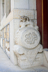 beast sculpture on the rock in a temple