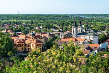 Fototapeta premium Sremski Karlovci, Serbia - May 2, 2018: Panorama of Sremski Karlovci. Panoramic view of The Gymnasium of Karlovci and St. Nicholas Cathedral
