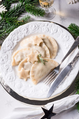 Polish style dumplings filled with sauerkraut and mushrooms