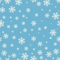 Snowflakes seamless Christmas pattern on blue background