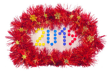 The number 2019, indicating the approaching new year in the frame of a red garland with golden snowflakes. The number is composed of details of a children's mosaic on a perforated plate.