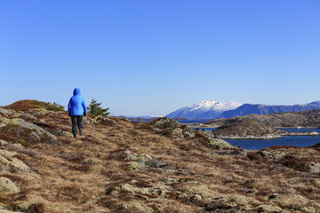 Fototapeta premium Happy walking to Helløya island in Nordland county