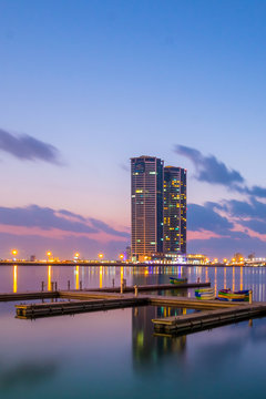 Ras Al Khaimah by night. View to beautiful bay with harbour in background