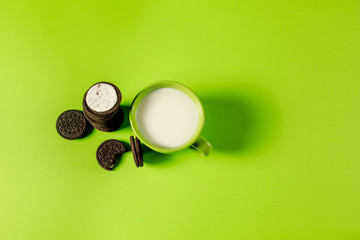 OREO Cookies on a green background.