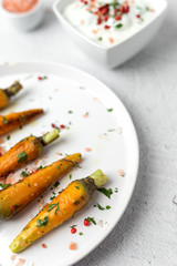 Healthy roasted carrots On white background
