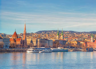 Embankment of the Danube River in Pest, Budapest, Hungary. Winter sunlight cityscape.