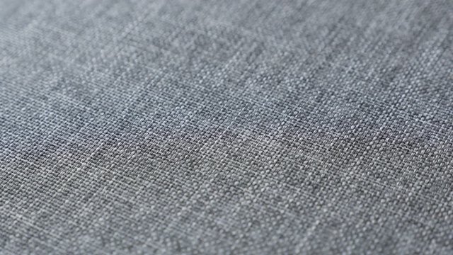 Upholstery fabrics detailed texture slow tilt 4K video